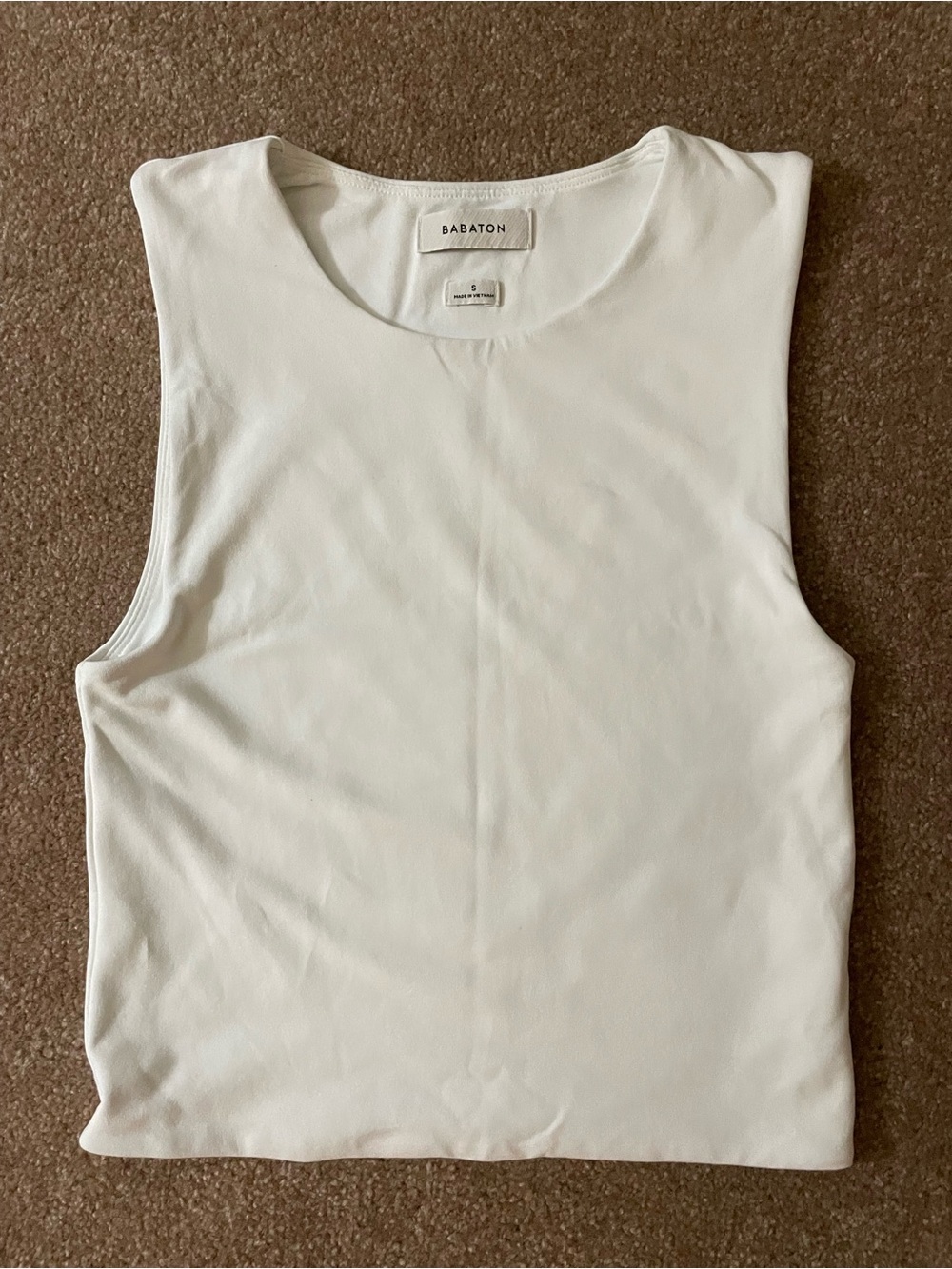 Babaton White Sleeveless Crewneck cropped tank.